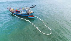 N-FIBER Oil Absorbent Boom deployed at sea