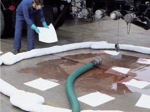 Oil absorbent pads at gas stations.